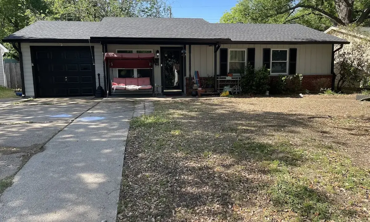 Asphalt Shingle Roof Repair crew at work on a residential roof in Fort Meade